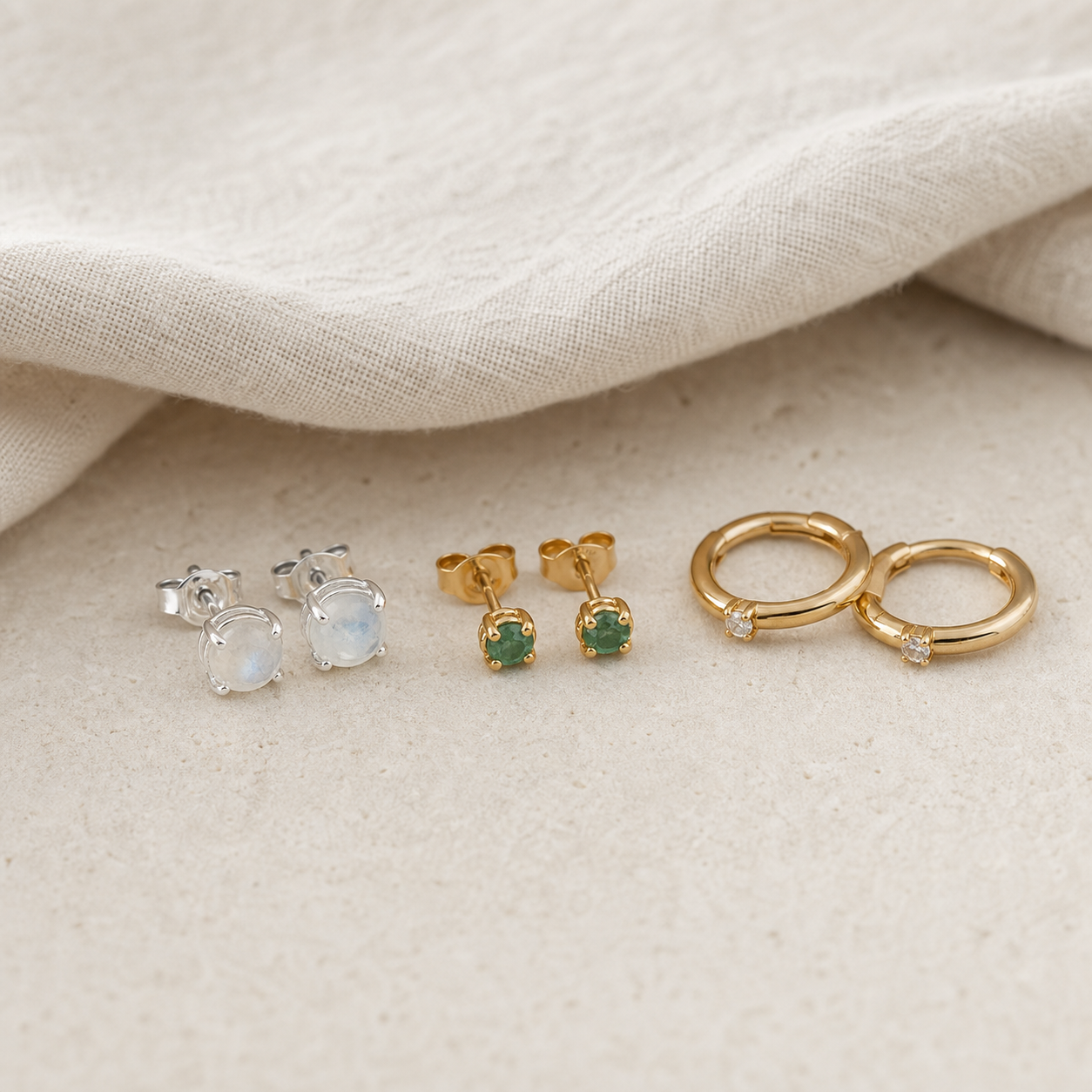 Sterling silver and gold plated earrings with gemstone details